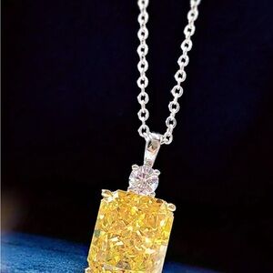 2 piece set. Yellow and Silver Crystal Pendant Necklace with matching earrings